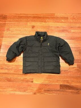 Browning olive green puffer jacket features iconic yellow branding